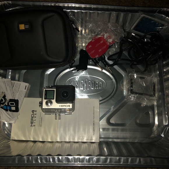 i have a gopro hero 4 touch screen never used comes with case accessories & book - Picture 2 of 2